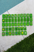 Floating Mahjong Tiles in bright green for the Pool