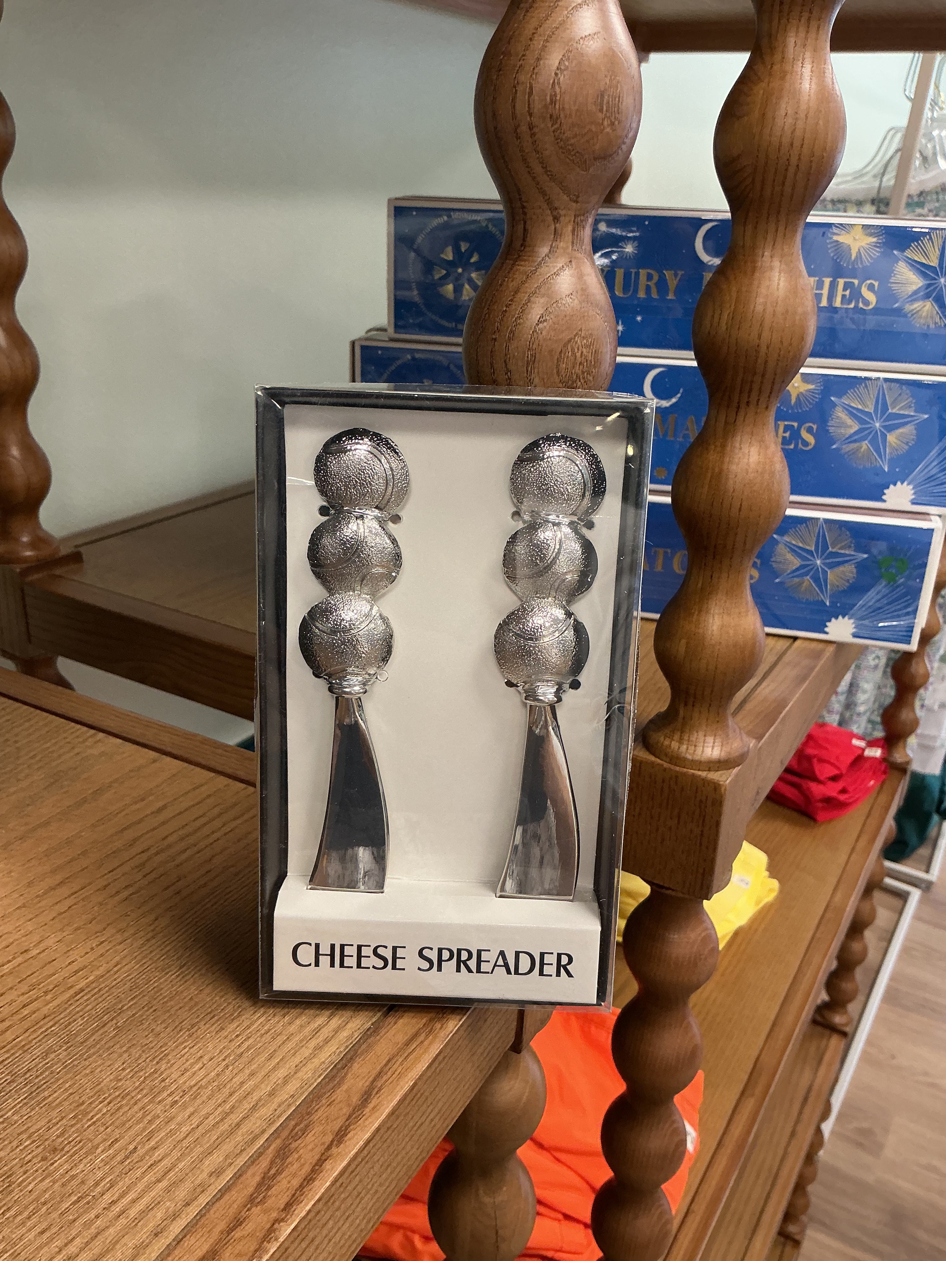 Tennis ball cheese spreader