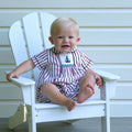 Bobbie's Shoppe sailboat smocked babysuit in red, white, and blue stripes with Peter Pan collar.